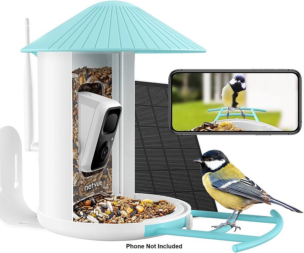 The image shows a bird feeder with a bird perched on it, and a cell phone is placed next to it. The text on the image reads "netvue Phone Not Included." This suggests that the bird feeder itself is a product by the brand "netvue," and the cell phone is not included in the package.
