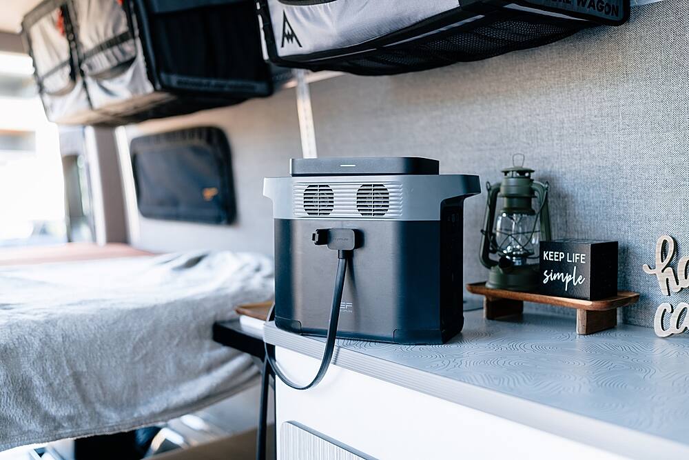 A small wagon with a sign that says "Keep Life Simple" is parked on a white counter.