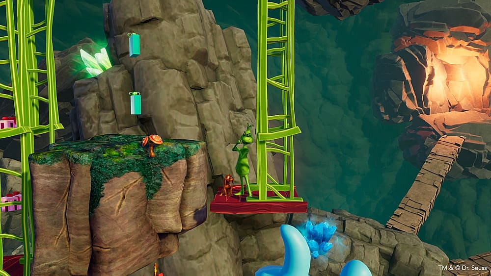 The image features a video game with a character standing on a platform near a waterfall. The character is holding a green bottle, and there are other bottles scattered around the scene. The game appears to be set in a cave environment, with a ladder and a bridge visible in the background. The game is likely inspired by the popular Dr. Seuss book, "One Fish Two Fish Red Fish Blue Fish."