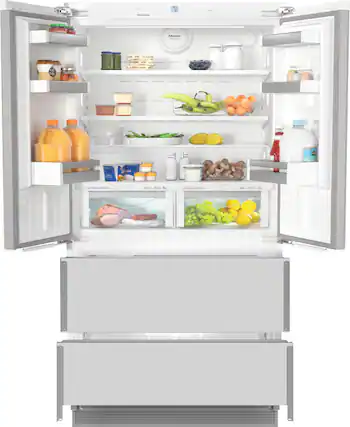 The image features a large refrigerator with its door open, revealing a well-stocked interior. The refrigerator is filled with various food items, including fruits, vegetables, and multiple bottles of juice. There are also several bowls placed throughout the refrigerator, likely containing different types of food. The refrigerator is organized in a way that makes it easy to find and access the items stored inside.