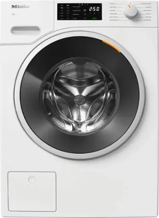 The image features a Miele washing machine with a large drum and a digital display. The machine is white and has a silver interior. The display shows the time and temperature settings for the wash cycle. The washing machine is designed to handle various types of laundry, including delicates, handwash, dress shirts, and more.