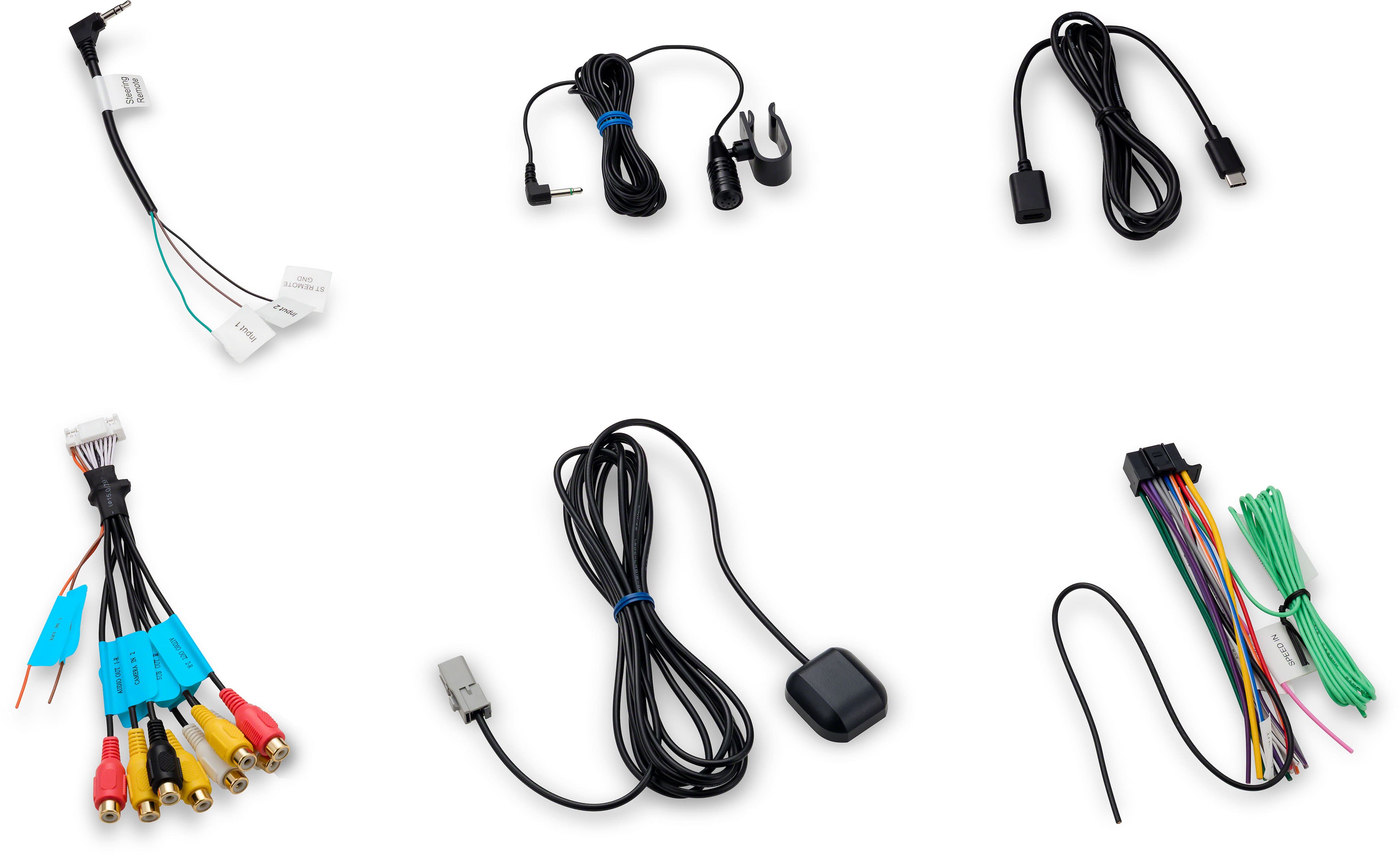 The image shows a collection of electronic cords and wires, including a variety of cords with different colors and lengths. There are also several cords with different connectors and adapters. The cords are arranged in a row, showcasing their variety and organization.