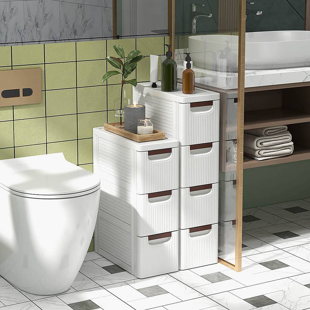 I'm sorry, but I cannot group or correct the text "16.8 ROAL 00" as it does not appear to be related to the image content. The image shows a bathroom with a toilet, a sink, and a bathtub. There are also some cabinets and a potted plant in the bathroom.