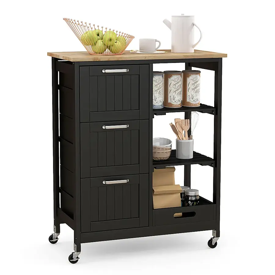 The image features a wooden cart with a black cabinet and a wicker basket on top. The cart is filled with various items, including a bowl of fruit, a cup, a coffee pot, and a spoon. There are also several apples placed on the cart. The cart is placed on wheels, making it easy to move around the room.