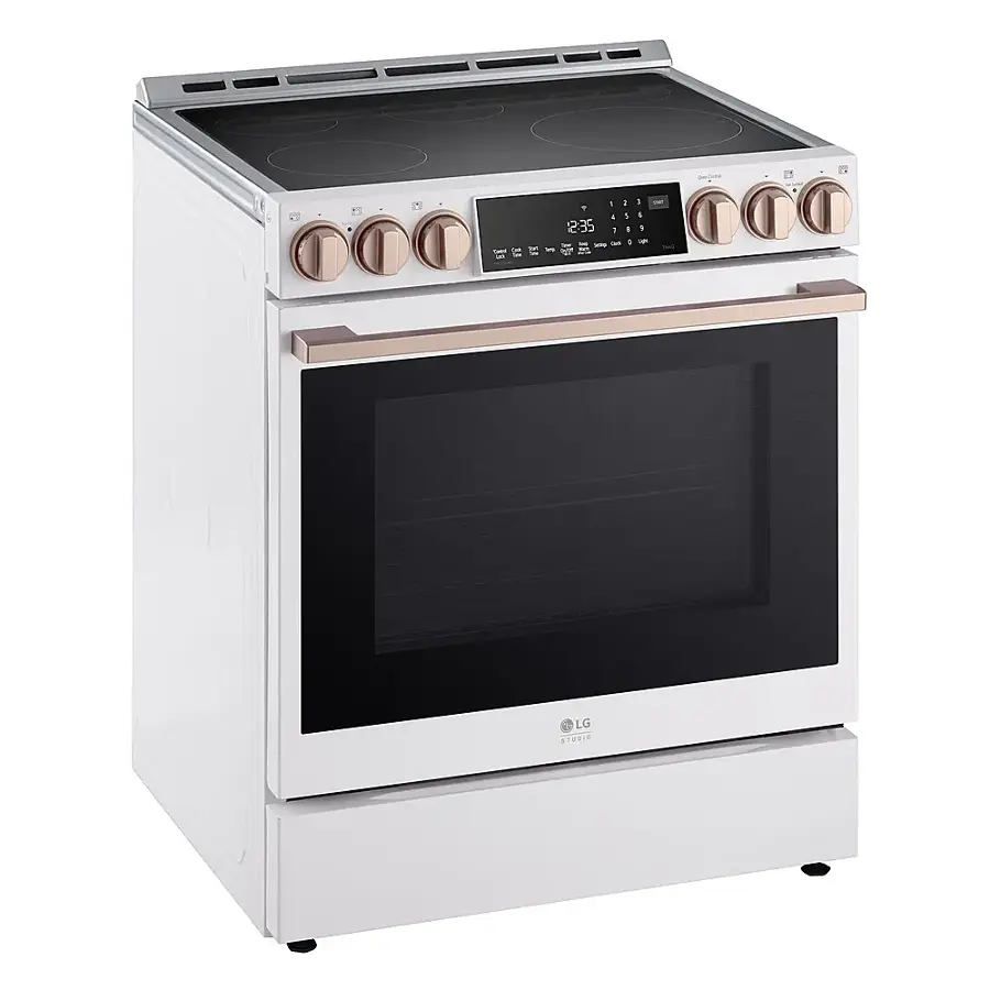 The image shows a white LG stove top oven with a digital display. The oven has a timer that can be set for up to 12:35 minutes. The stove is equipped with a range of knobs, including one for the oven, one for the stove, and one for the timer. The oven is white and appears to be a modern, sleek design.