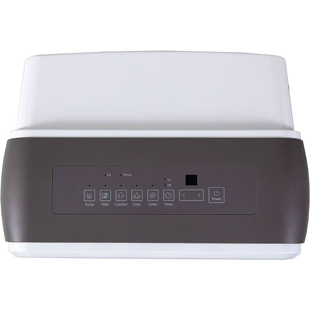 The image features a white and black electronic device with a display and buttons on the front. The device is likely a microwave or a small appliance, as it is sitting on a countertop. The buttons on the front are labeled with various functions, such as defrost, pump filter, comfort cook, turbo timer, and power. The display on the front shows the current settings or status of the device.