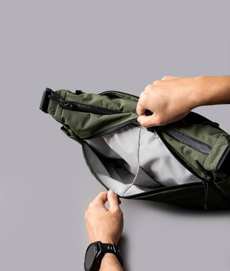 Alt View 4. ALPAKA - Laptop Messenger Satchel Bag 11L for Work & Travel, Fits 13" MacBook Air, Bottle Pockets, Luggage Pass-Through - Green Axoflux 210D.