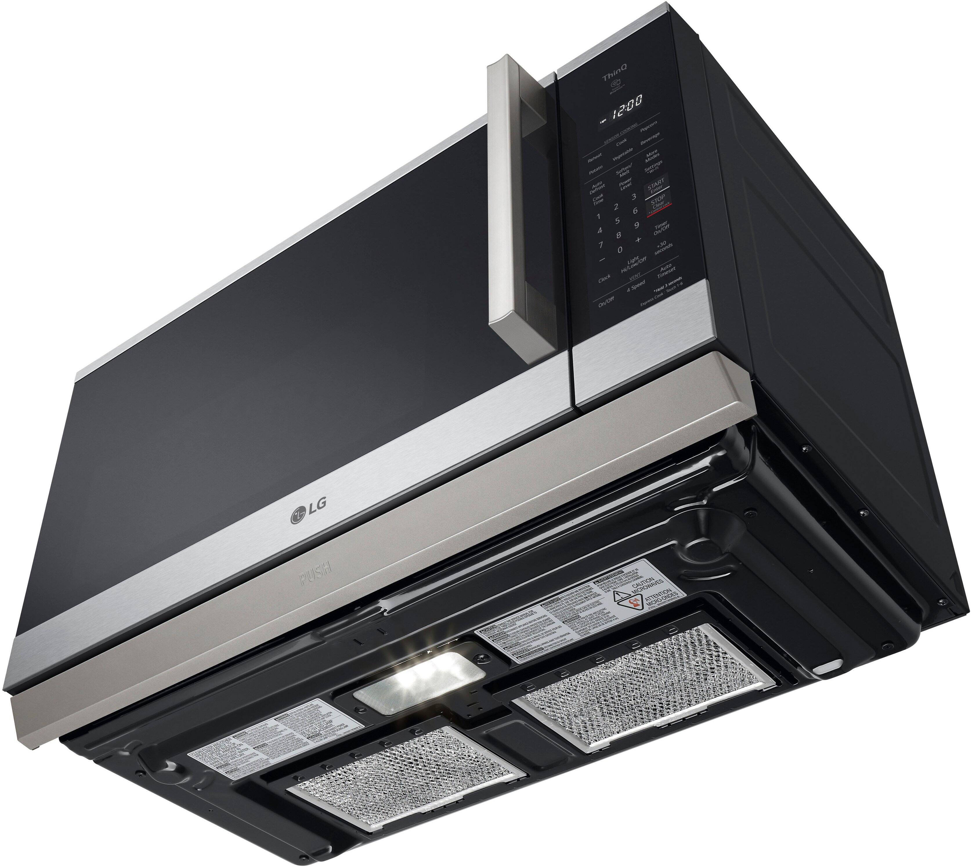 The text on the image reads: "Thin DC 005I - it SRARY I 3 2 6 1 5 9 - a a 7 a - Lm 1N aUEm Y LG PUSH - sesE TEIS -". This text is likely a description or a code related to the microwave oven.