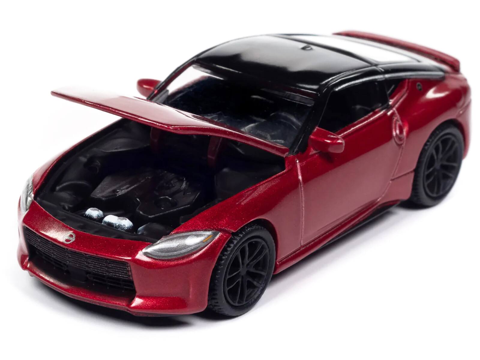 Left. Autoworld - 2023 Nissan Z Passion Red Metallic with Black Top "Import Legends" Series 1/64 Diecast Model Car by Auto World - Red Metallic And Black.