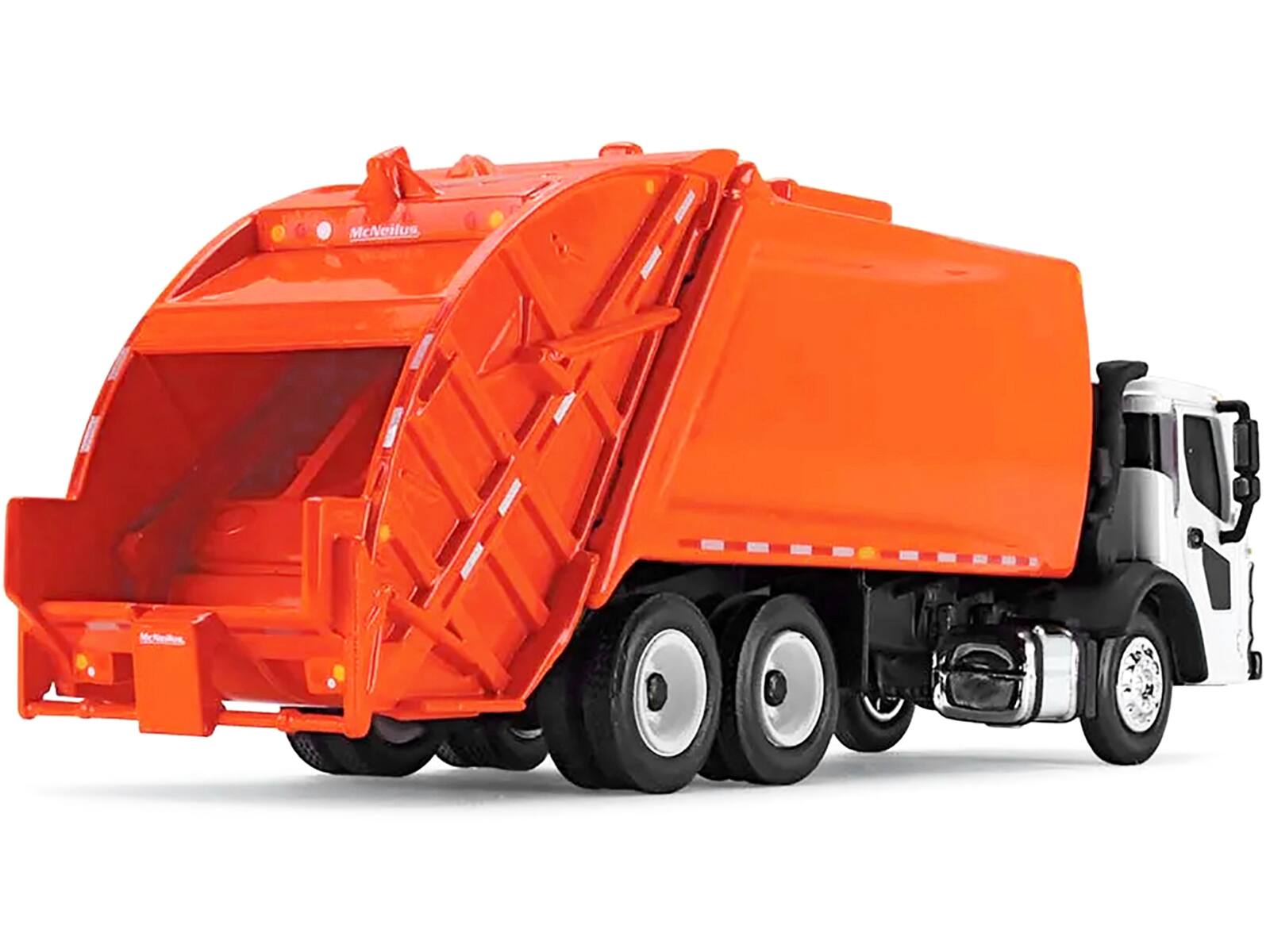 Angle. First Gear - Mack LR with McNeilus Rear Load Refuse Body Orange and White 1/87 (HO) Diecast Model by First Gear - Orange and White.