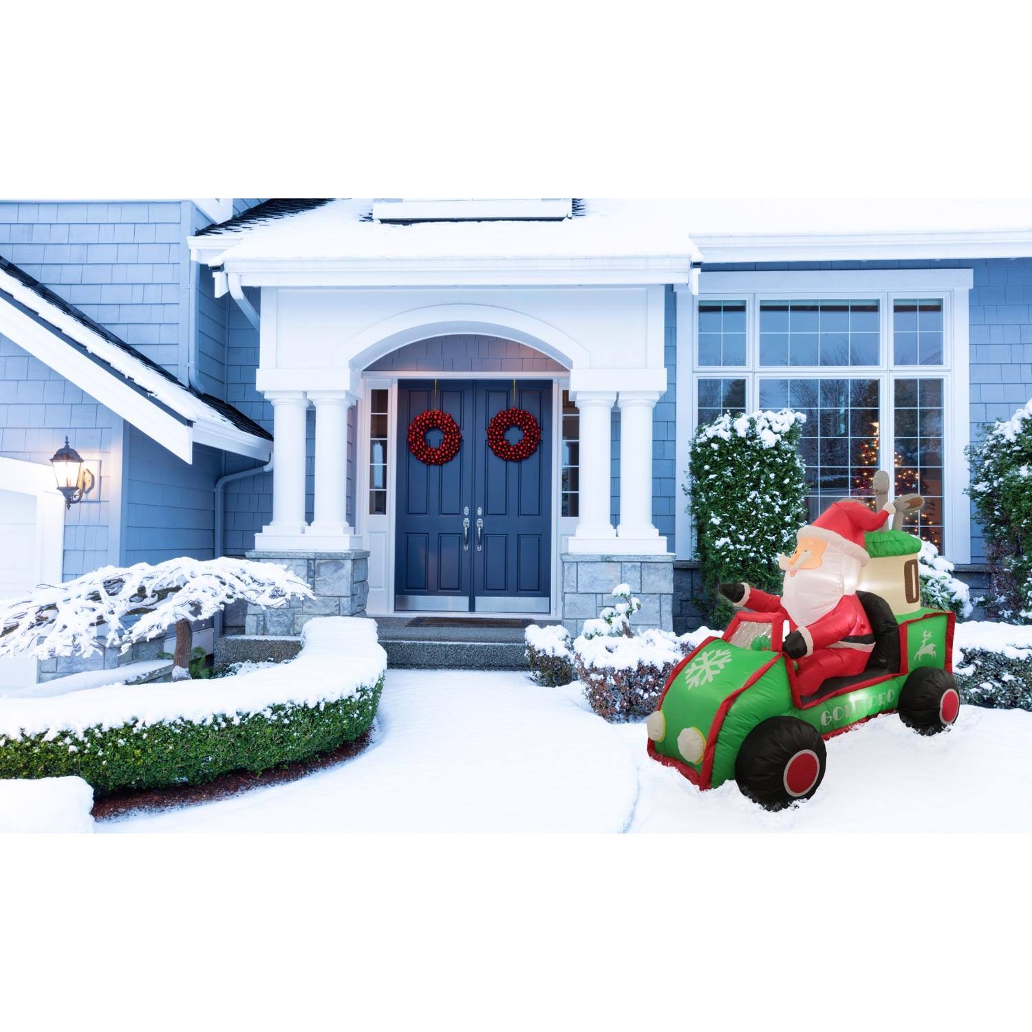 Left. Celebrations - Celebrations Santa in Golf Cart 6 ft. Inflatable - Multicolored.