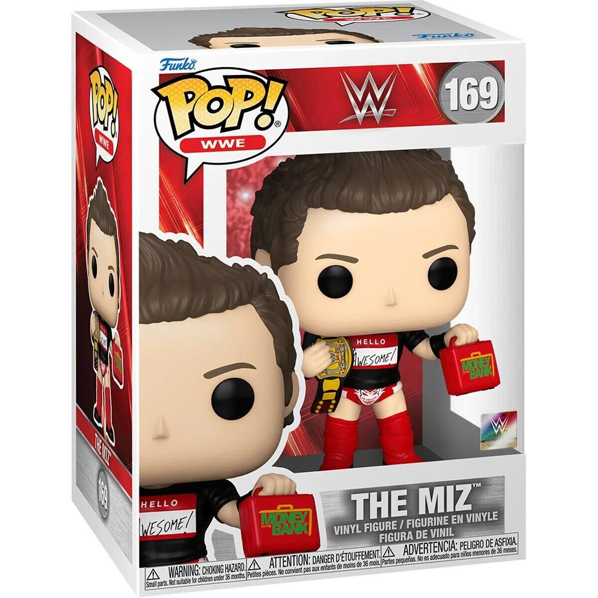 Funko M POP! W 169 WWE
WWE
HELLO
WESOME!
MONEY BANK
W
TE C8
HELLO
THE MIZ
MONEY
FIGURINE
EN
VINYLE
WESOME!
BANK
VINYL
FIGURE
FIGURA
DE
VINIL
PELIGRO
DE
ASFIXIA,
D'TOUFFEMENT.
A
ADVERTENCIA:
para
mitkos
menores
de
3
meses
DANGER
pequeras.
l
i5
adecuado
HAZARD
ATTENTION:
aX
entiants
de
moine
de
36
moins.
Partes
WARNING:
CHOKING
Petfes
pieces
&e
convient
pes
chidren
under
36
nonths,
Not
sutable
i
Small
pars