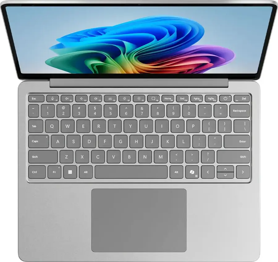 The text on the image is a keyboard layout, which is a diagram of the keys on a keyboard. It shows the positions of the letters, numbers, and symbols on the keyboard. The layout is typically used to help users familiarize themselves with the keyboard, especially when learning a new language or operating system.