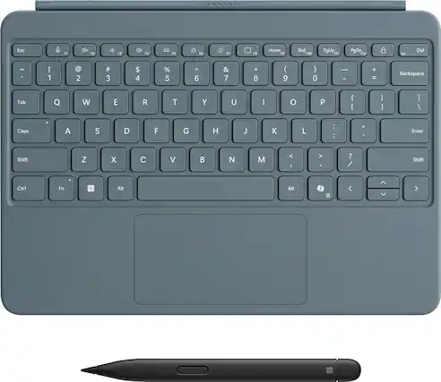 The image features a close-up of a keyboard with a pen placed next to it. The keyboard has a variety of keys, including letters, numbers, and symbols. The keys are arranged in rows, with some keys grouped together and others spaced apart. The keyboard also has a spacebar and a shift key. The pen is positioned near the top right corner of the keyboard, ready for use.