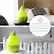 The image features a baby's nursery with a green humidifier on a table. The humidifier is an ultrasonic cool mist and auto-shut off safety feature, making it safe for kids. The nursery is equipped with a crib and a couch, creating a comfortable and cozy environment for the baby.