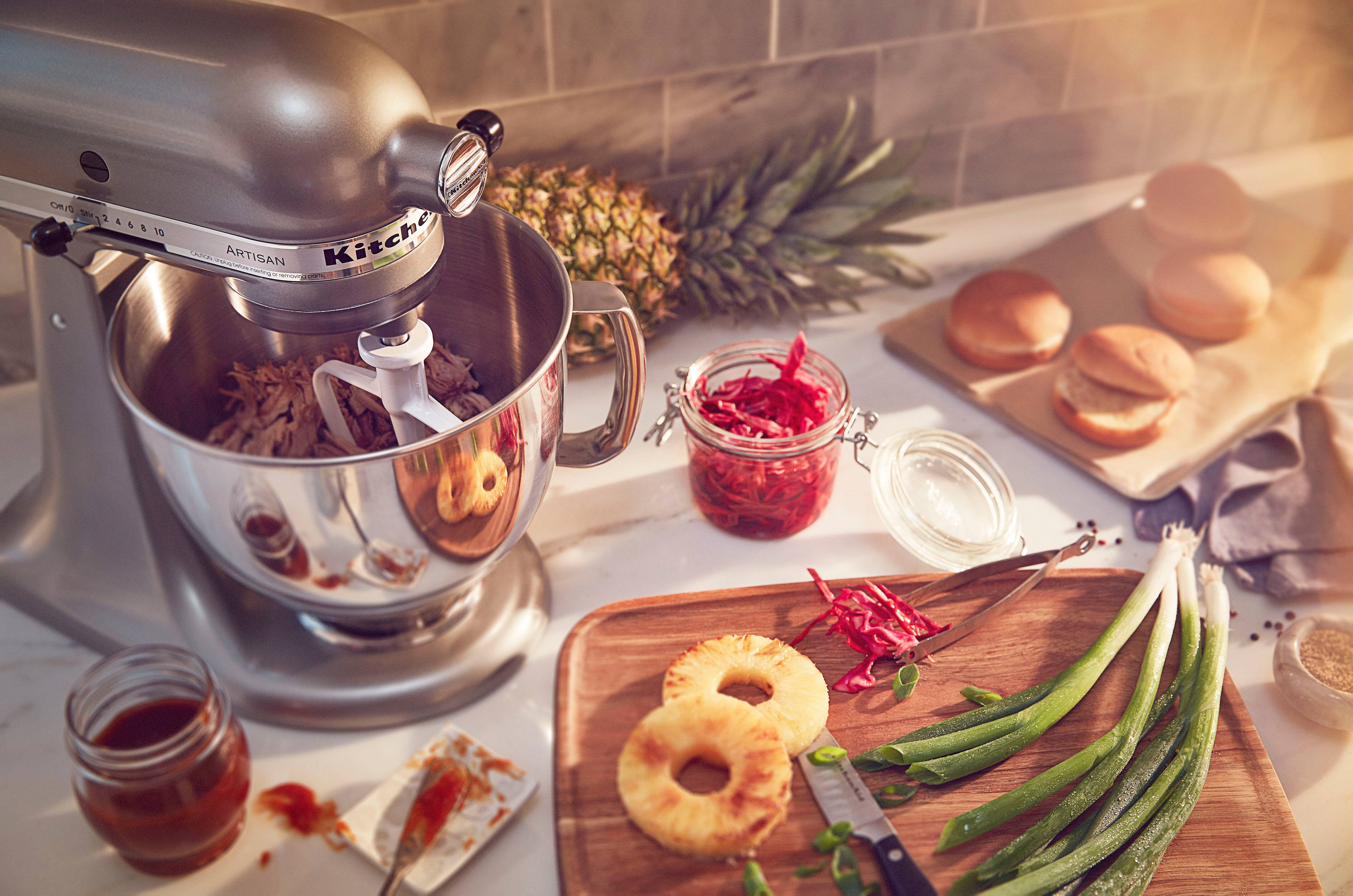 Left. KitchenAid - Artisan Series 5 Quart Tilt-Head Stand Mixer - KSM150PSCU - Contour Silver.