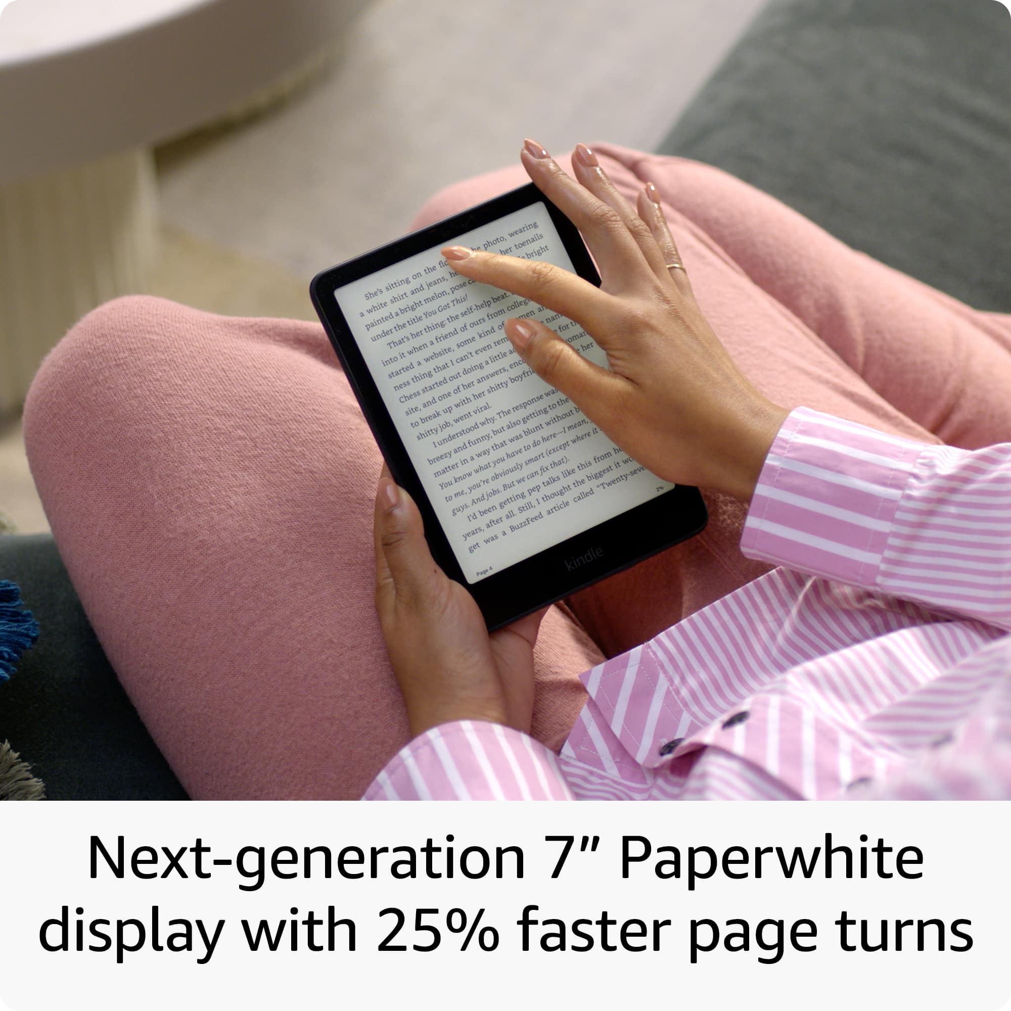 The image shows a woman sitting on a couch, holding a tablet in her hands. She is reading an article on the tablet, which is a next-generation 7" Paperwhite display with 25% faster page turns. The tablet is bright white and has a paperwhite display, making it easy to read in various lighting conditions. The woman is focused on the content, and the scene captures a moment of relaxation and leisure.