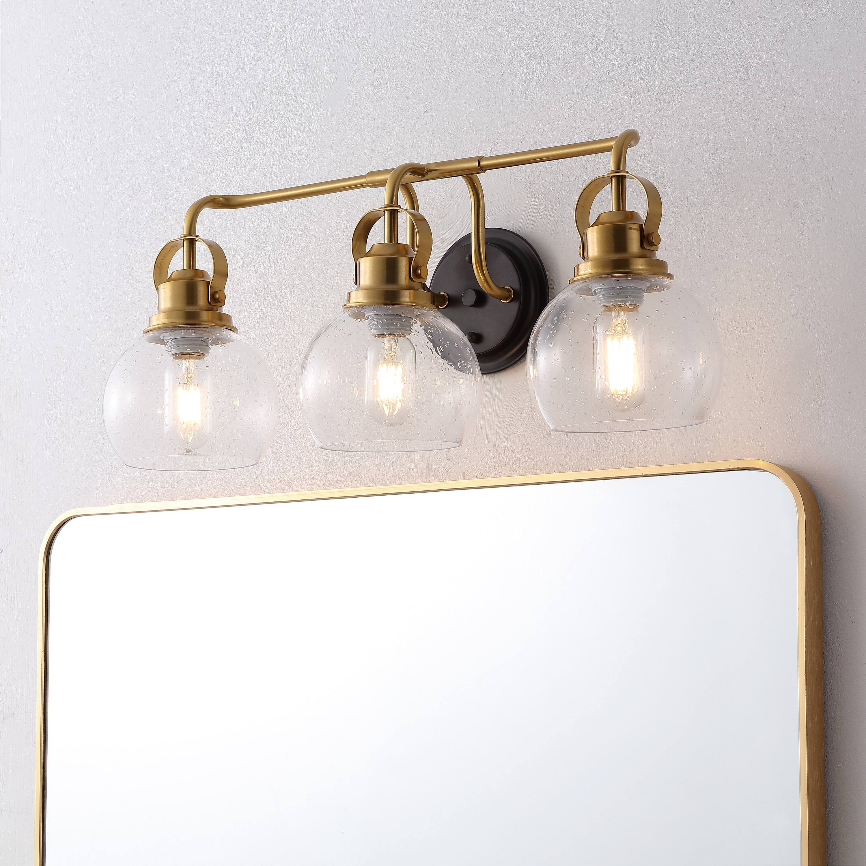 Alt View 1. Jonathan Y - Shirley 24" 3-light Farmhouse Metal LED Vanity Light with Seeded Glass Globe Shades, Brass Gold/Oil Rubbed Bronze - Brass Gold/Oil Rubbed Bronze.