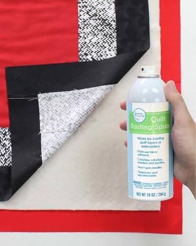 ITAILOR Quilt Basting Spray  
Works for basting quilt layers or embroidery  
Multi-use fabric adhesive  
Colorless, odorless, non-toxic, and solvent-free  
Won't gum needles  
Temporary and repositionable  
NET WT 10 OZ / 284 g