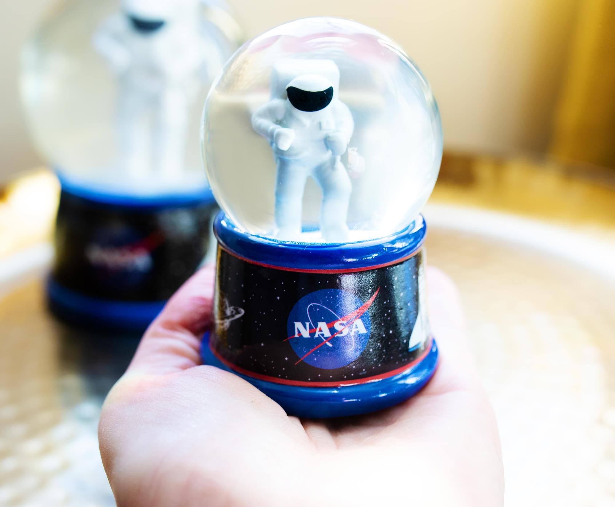 Alt View 2. Silver Buffalo - NASA Astronaut Light-Up Mini Snow Globe | 2 Inches Tall - Blue.