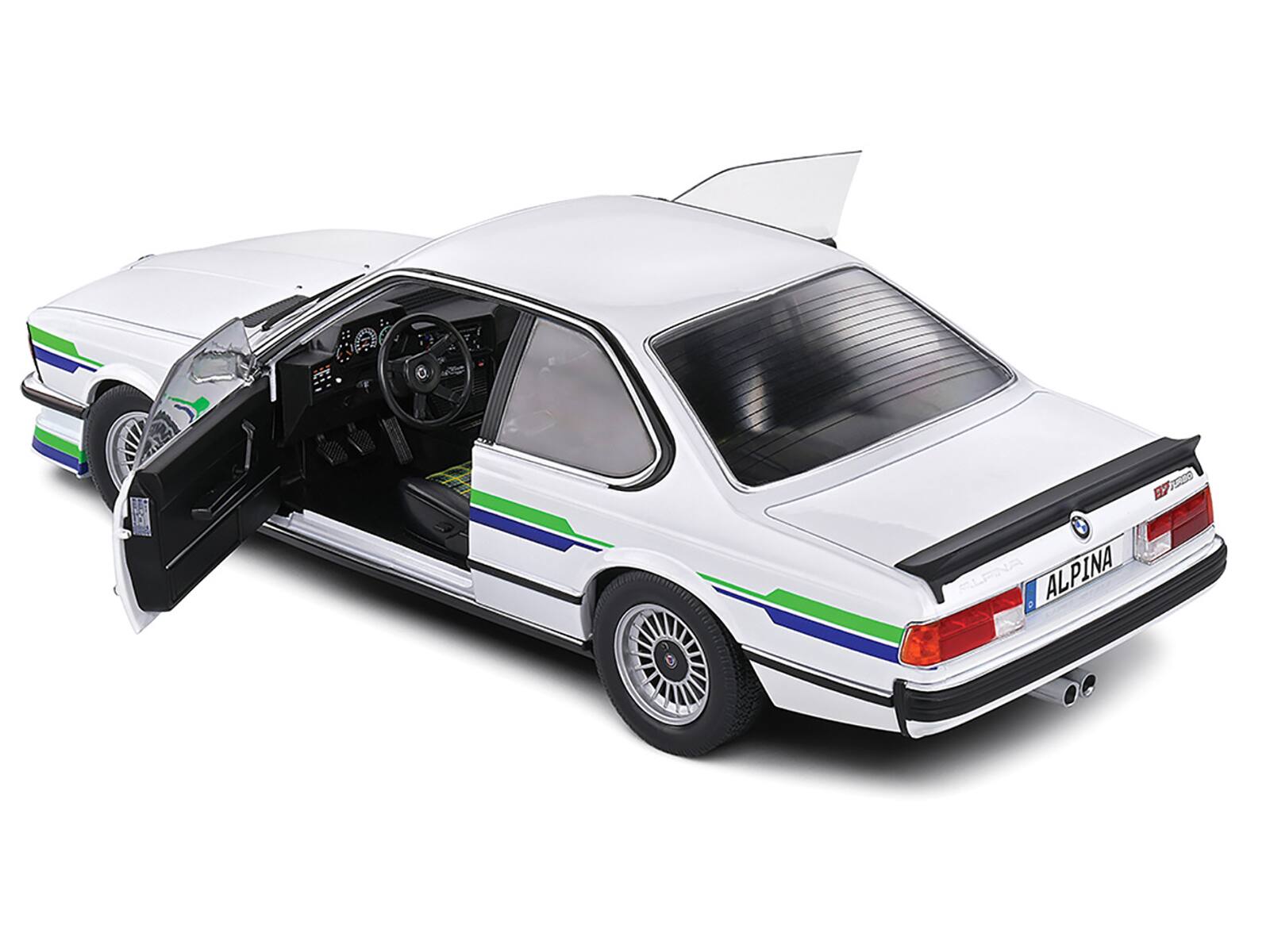 Alt View 1. Solido - 1984 BMW Alpina B7 Turbo (E24) White with Blue and Green Graphics 1/18 Diecast Model Car by Solido - White with Blue and Green.