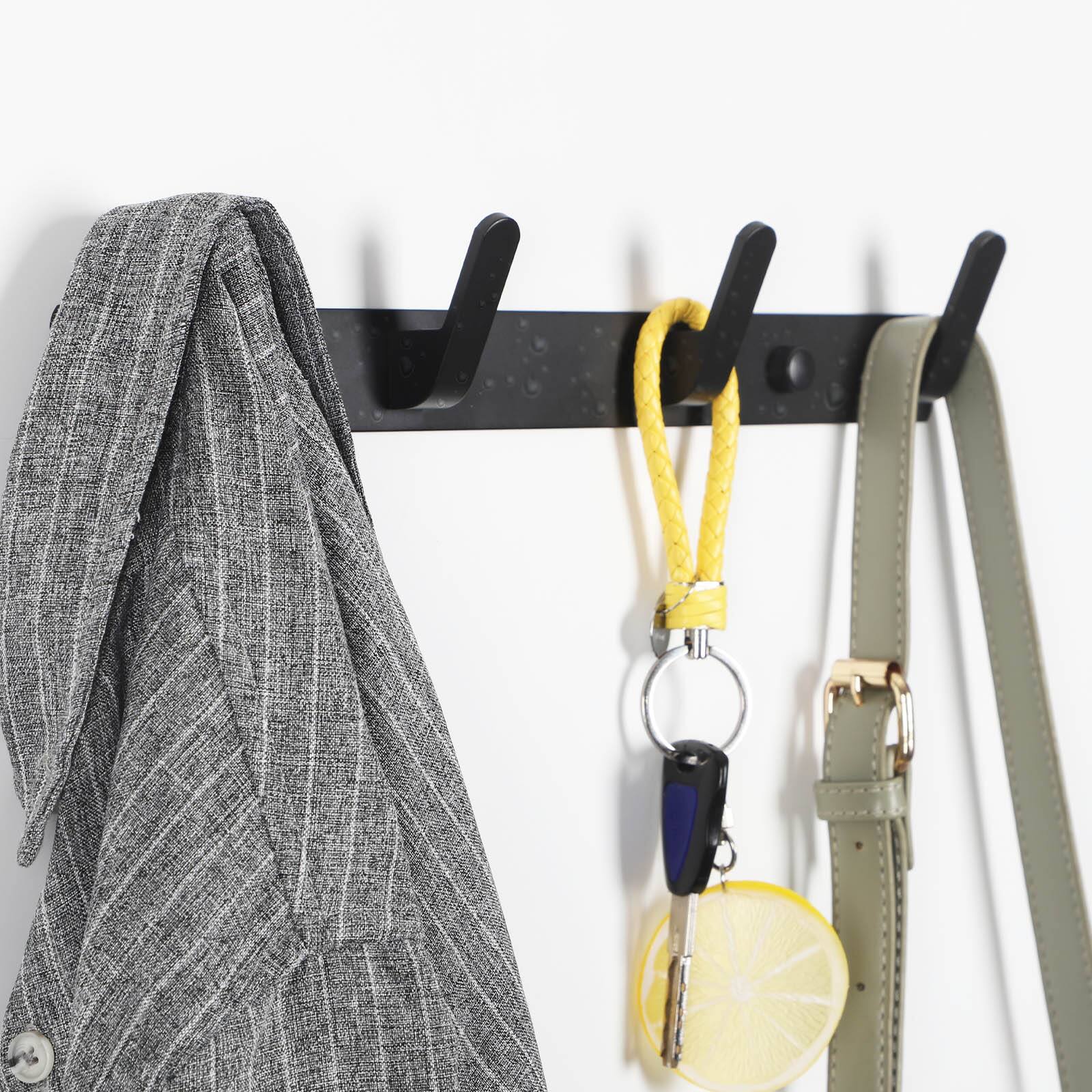 Left. Oumilen - Black Metal Wall Coat Rack with 4 Hooks – No Drill Adhesive Hanger for Coats, Towels, Bathroom, Kitchen - Black.