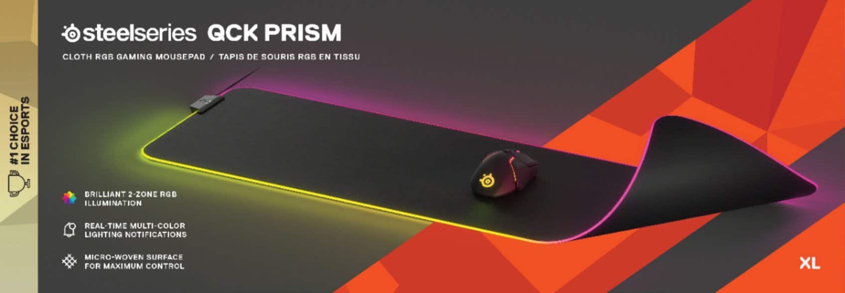 The text on the image reads: "Steelseries QCK PRISM CLOTH RGB GAMING MOUSEPAD / TAPI / TAPIS DE SOURIS RGB EN TISSU CHOICE ESPORTS #1 IN BRILLIANT 2-ZONE RGB ILLUMINATION REAL-TIME MULTI-COLOR LIGHTING NOTIFICATIONS MICRO-WOVEN SURFACE FOR MAXIMUM CONTROL XL."