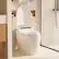 Angle. Famapy - Smart Bidet Toilet with Auto Open Lid, Heated Seat, Warm Air Dryer, Touchless Flush and Safety Protection - White.