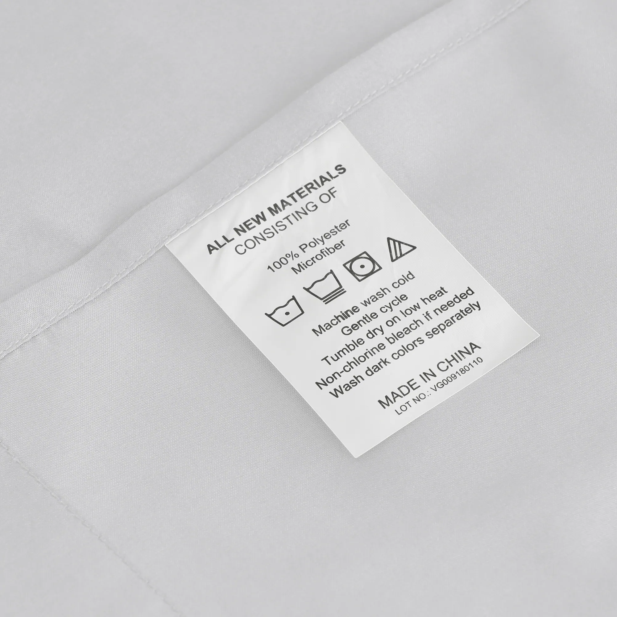 ALL NEW MATERIALS  
CONSISTING OF  
100% Polyester Microfiber  

Machine wash cold  
Gentle cycle  
Tumble dry on low heat  
Non-chlorine bleach if needed  
Wash dark colors separately  

MADE IN CHINA  
LOT NO.: VG009180110