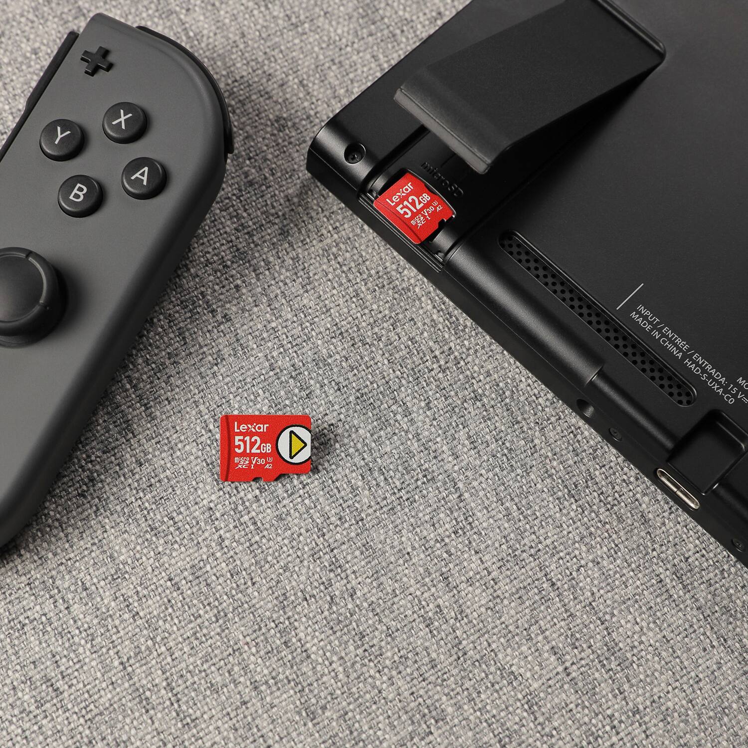 + X Y A B Lexar mierast 512GB  
wg o a Al MADE INPUT IN ENTREE I ENTRADA: MC 15 V= Lexar 512GB GE 0