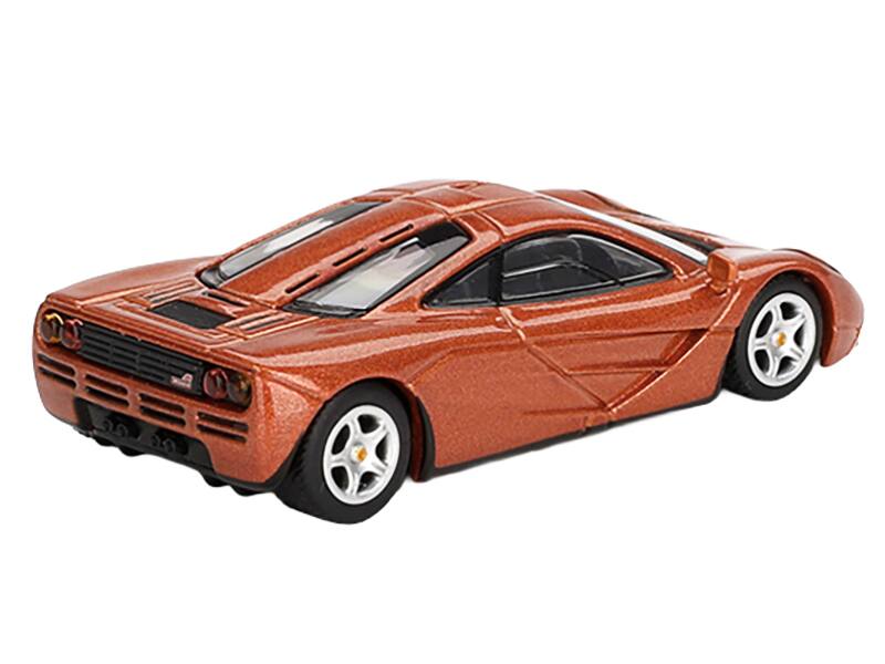 Left. Mini GT - McLaren F1 Yquem Orange Metallic Limited Edition 1/64 Diecast Model Car by Mini GT - Orange Metallic.
