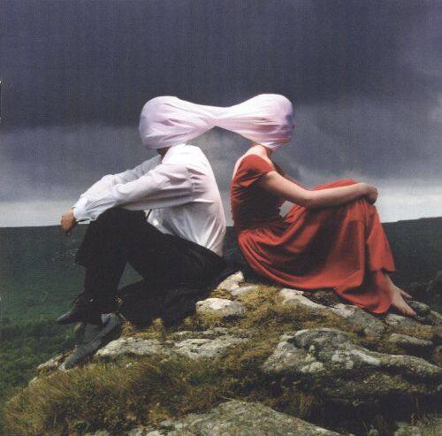 Front. Casually Dressed and Deep in Conversation [CD] [PA].