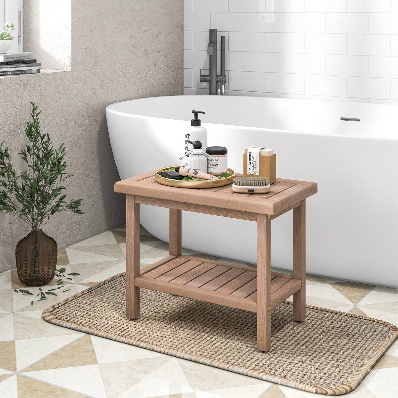 The image features a bathroom with a white bathtub. A wooden table is placed next to the tub, holding a tray with various bath products, including a bottle of lotion and a bar of soap. The table also has a potted plant on it, adding a touch of greenery to the bathroom. The overall scene is clean and well-organized, creating a relaxing atmosphere for a bath.