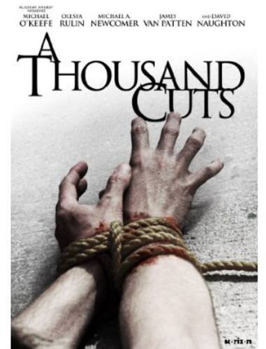 Front. A Thousand Cuts   - DVD.