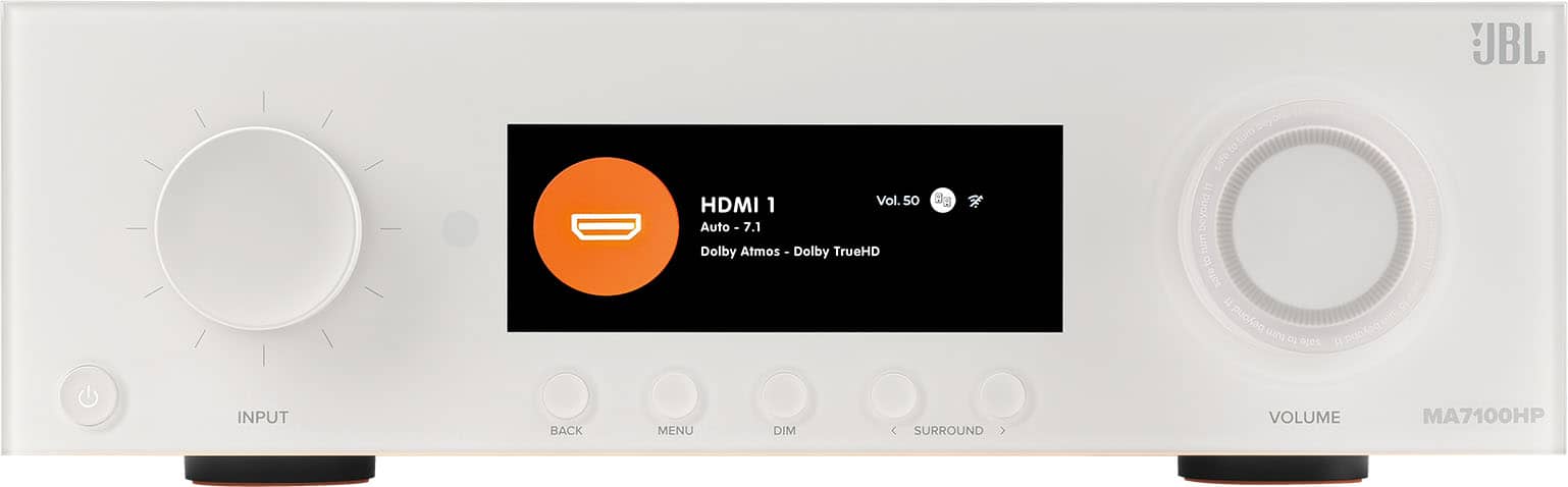 The text on the image reads: "HDMI 1 Vol. s0 Auto 7.1 Dolby Atmos - Dolby TrueHD beyond1i tum safeto H beyond uina 01 djes beyend UBL INPUT BACK MENU DIM SURROUND VOLUME MA7100HP."