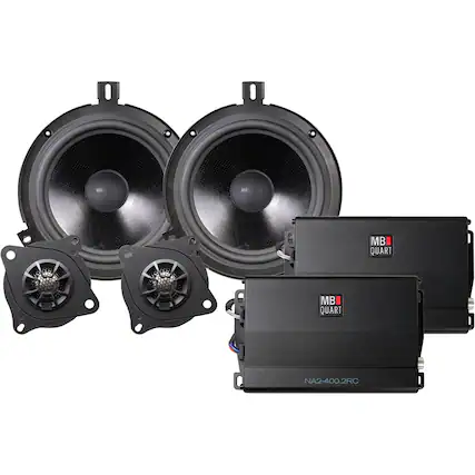 The image features a set of four MB Quart speakers, including two subwoofers and two tweeters. The speakers are arranged in a way that showcases their design and quality. The MB Quart brand is known for producing high-quality audio equipment, and these speakers are no exception. The combination of the subwoofers and tweeters ensures that the audio system delivers a balanced and powerful sound experience.