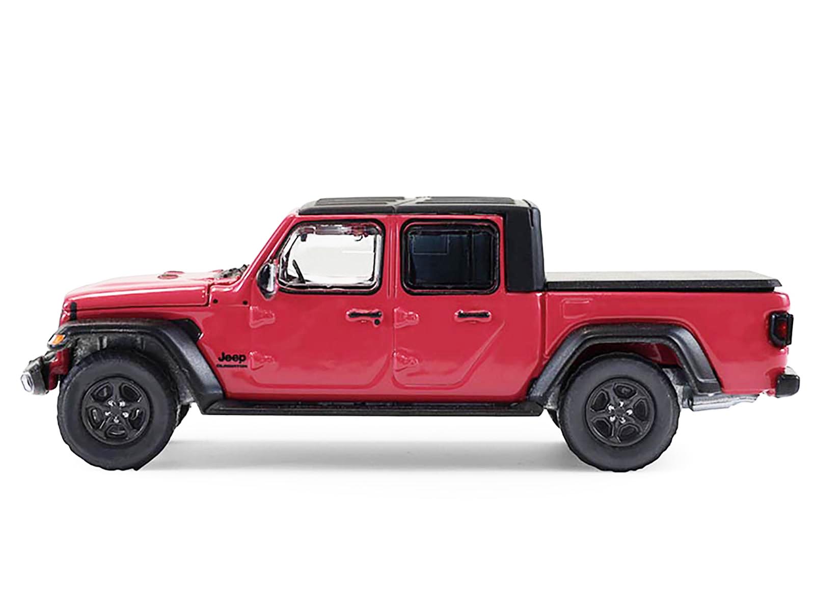 Left. Greenlight - 2024 Jeep Gladiator Pickup Truck Tuscadero Pink with Black Top "Showroom Floor" Series 7 1/64 - Pink with Black Top.