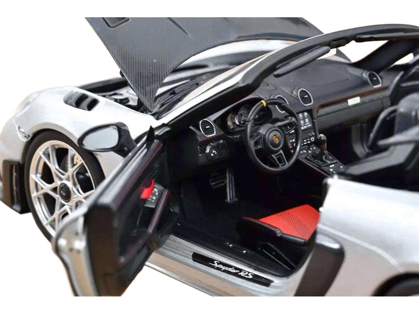 Back. Norev - 2023 Porsche 718 Spyder RS Weissach Pack GT Silver Metallic with Carbon Hood 1/18 Diecast Model Car by Norev - Silver Metallic.