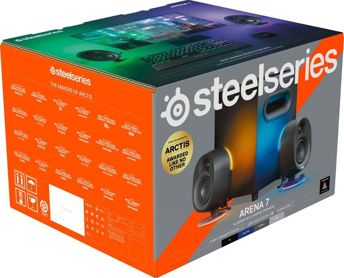 The box is for Steelseries Arctis 7X, which includes a headset, speakers, and subwoofer. The headset is wired and has been awarded best gaming headset in multiple categories. The speakers and subwoofer are illuminated and have a Bluetooth design.