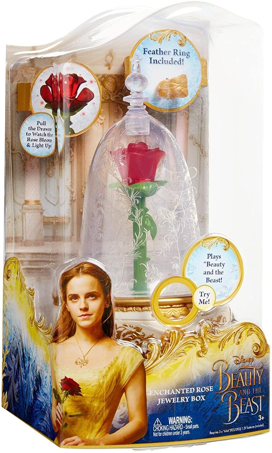 Feather Ring Included! Pull the Drawer to Watch the Rose Bloom & Light Up Plays "Beauty and the Beast! Try Me! Disney ENCHANTED ROSE BEAUTY AND THE JEWELRY BOX WARNING: CHOKING HAZARD - Small parts. Not for children under 3 years. Requires 3 "AAA" (3) batteries.