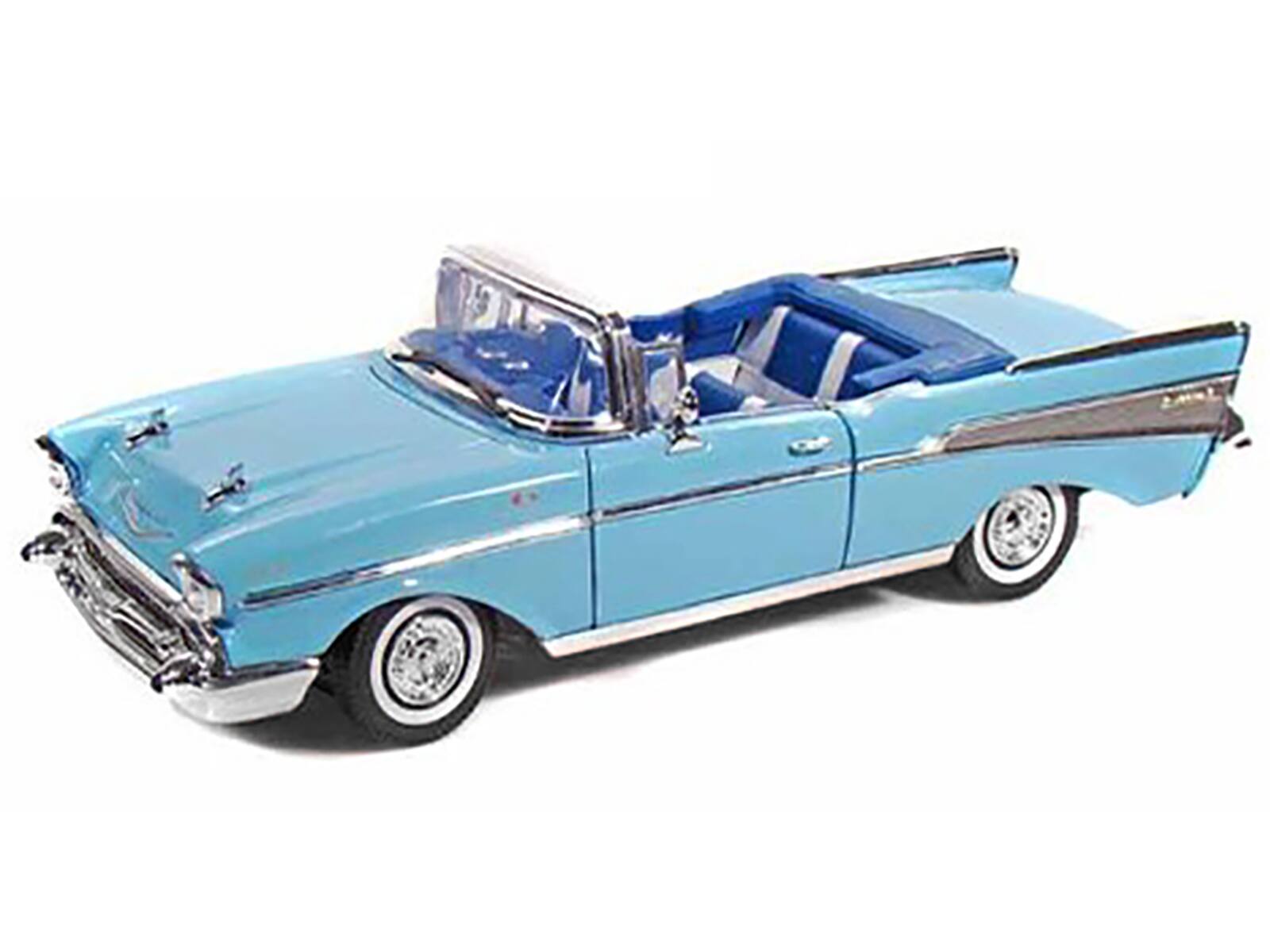 Angle. Motormax - 1957 Chevrolet Bel Air Convertible Light Blue with Blue Interior 1/18 Diecast Model Car by Motormax - Light Blue.