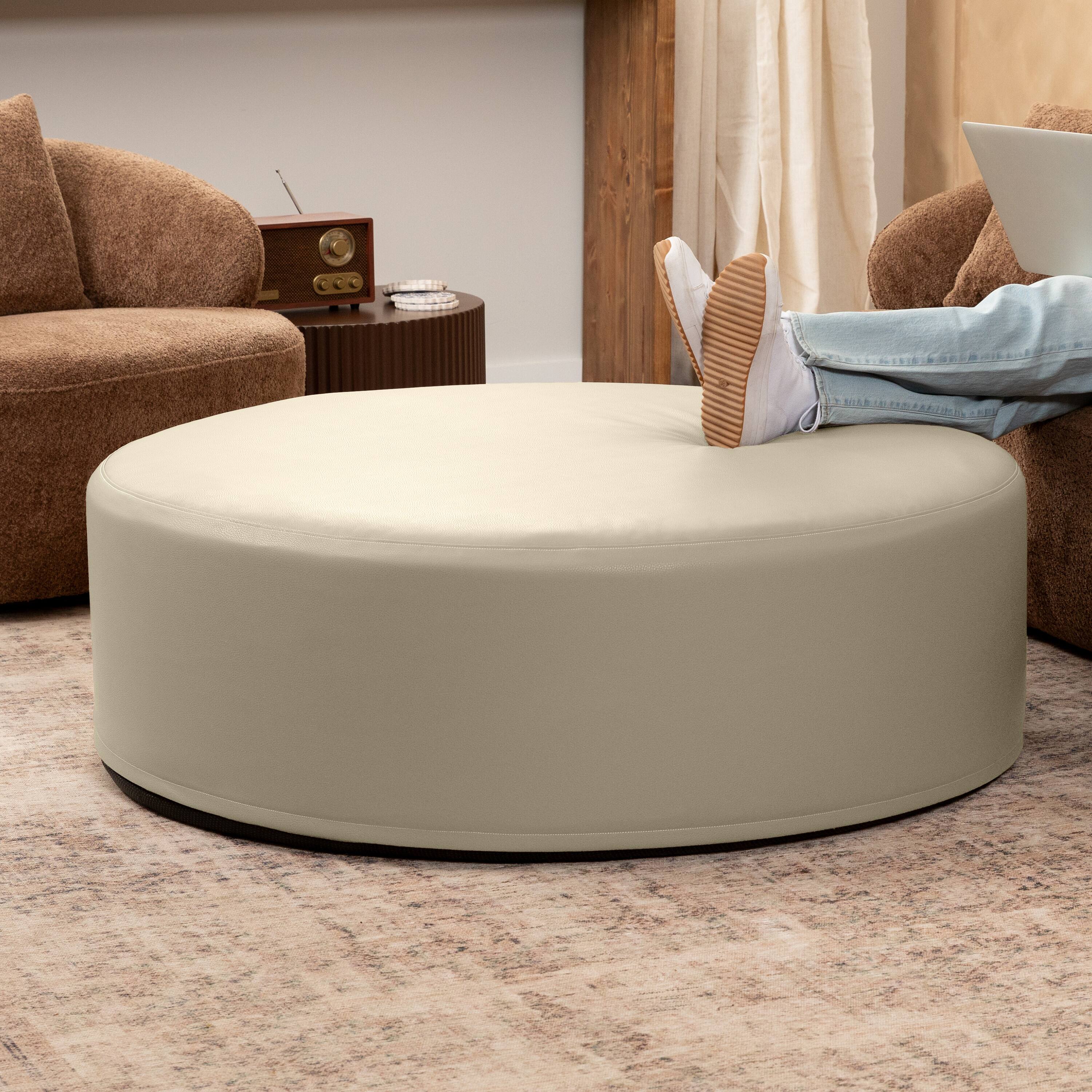 Angle. Jaxx - Jaxx Candler Round Couch Oversized Giant Coffee Table Ottoman 44”,  Natural - Faux Leather Natural.