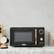 Alt View 1. Haden - 7 cu.ft 700 Watt Countertop Microwave with Settings and Timer - Black and Copper.