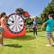 Angle. Costway - Large Dart Board for Kids with 4 Kick Balls, Carrying Bag Giant Outdoor Kick Red - Red.