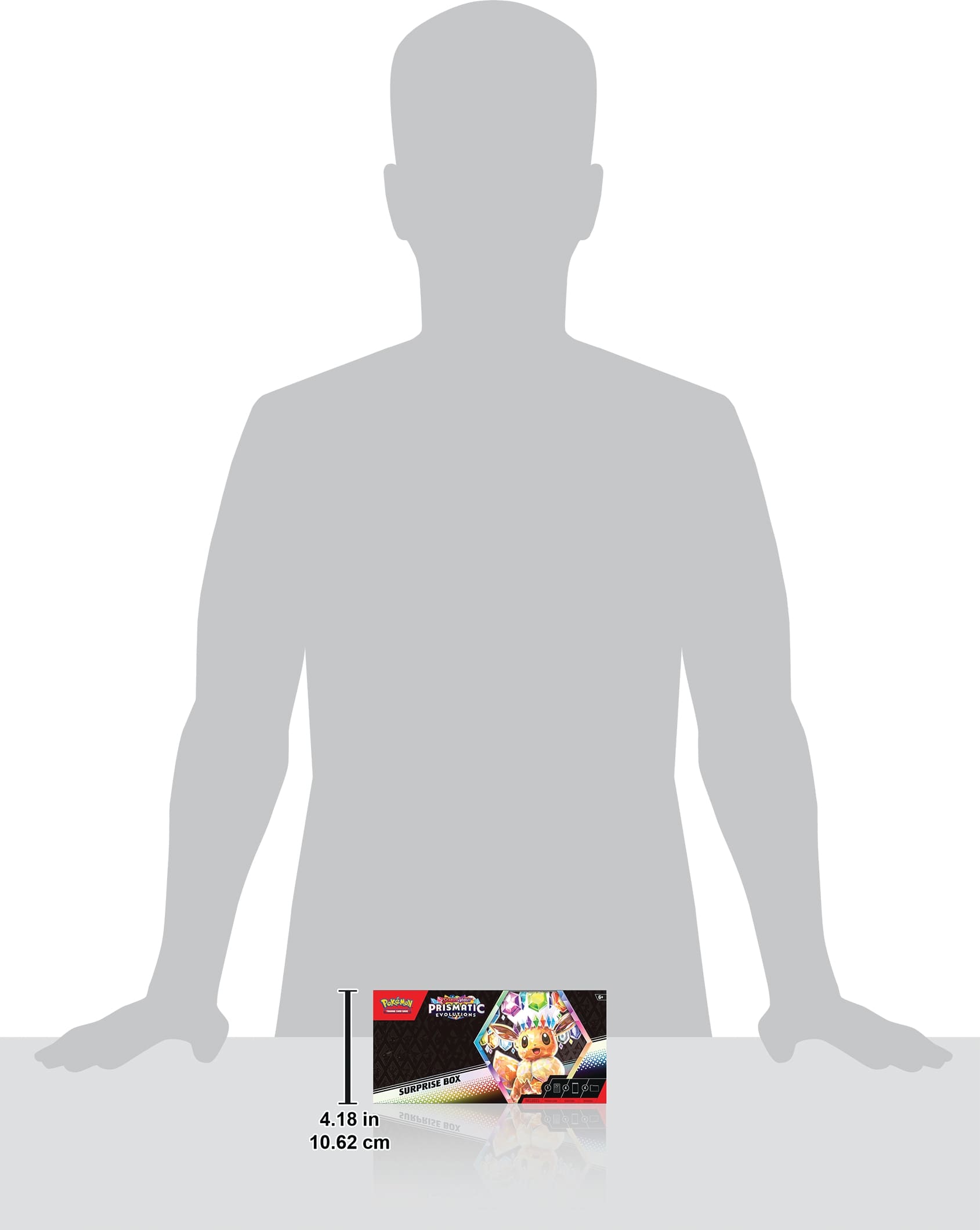 The text on the image reads: "TUDAPRISMATIC BOX SURPRISE 4.18 in CTRVTS 2 10.62 cm pap0de." This text describes a box that is 4.18 inches in circumference and 2 inches in diameter. The box is made of paper and is designed to surprise the recipient.