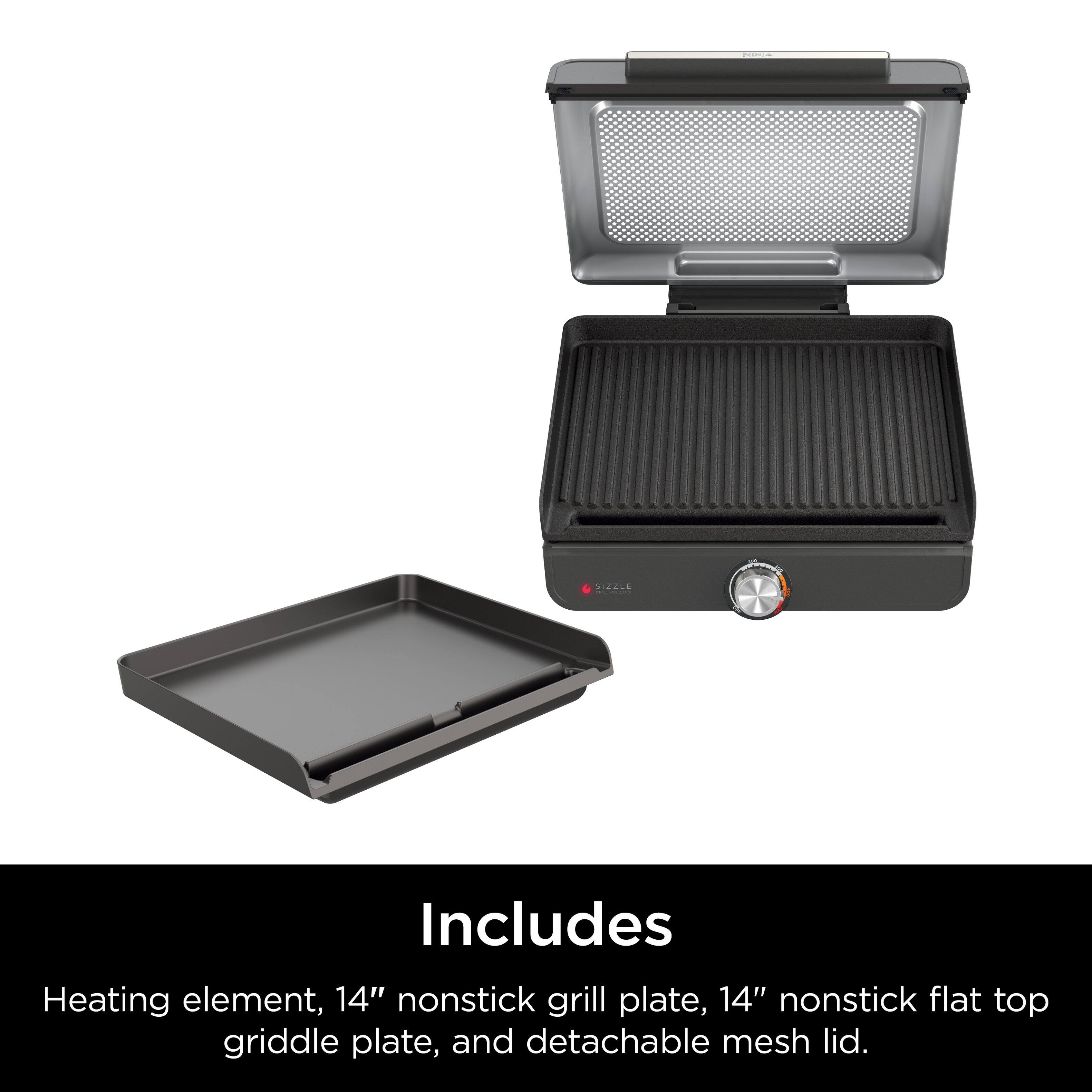 The image features a black grill with a detachable mesh lid. Included with the grill are a 14" nonstick grill plate and a 14" nonstick flat top griddle plate. The grill also has a heating element, making it a versatile and convenient appliance for cooking a variety of dishes.