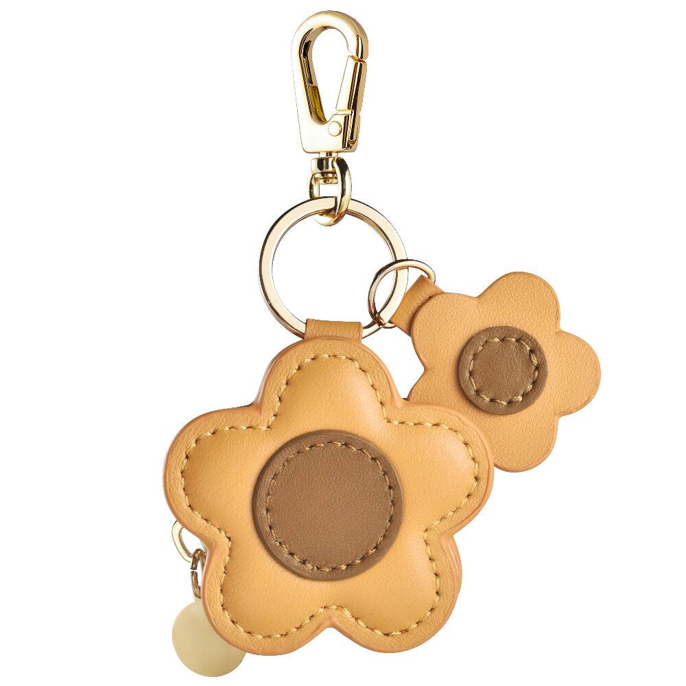 Left. Posh Tech - Flower Leather Bag Charm for Airtag® - Brown.
