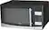 Front. Oster - 1.1 Cu. Ft. Mid-Size Microwave - Stainless steel.