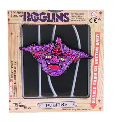 For ages 8 and up
BOGPINS
OUTRAGEOUS CREATURES THAT COME ALIVE IN YOUR HANDS!
BEWARE: FINGERS CAN'T HANDLE THROUGH BOTTOM BARS!
HANDLE THROUGH BOTTOM BARS ONLY!
This is not a toy. Decorative pin
TRI ACTION TOYS
