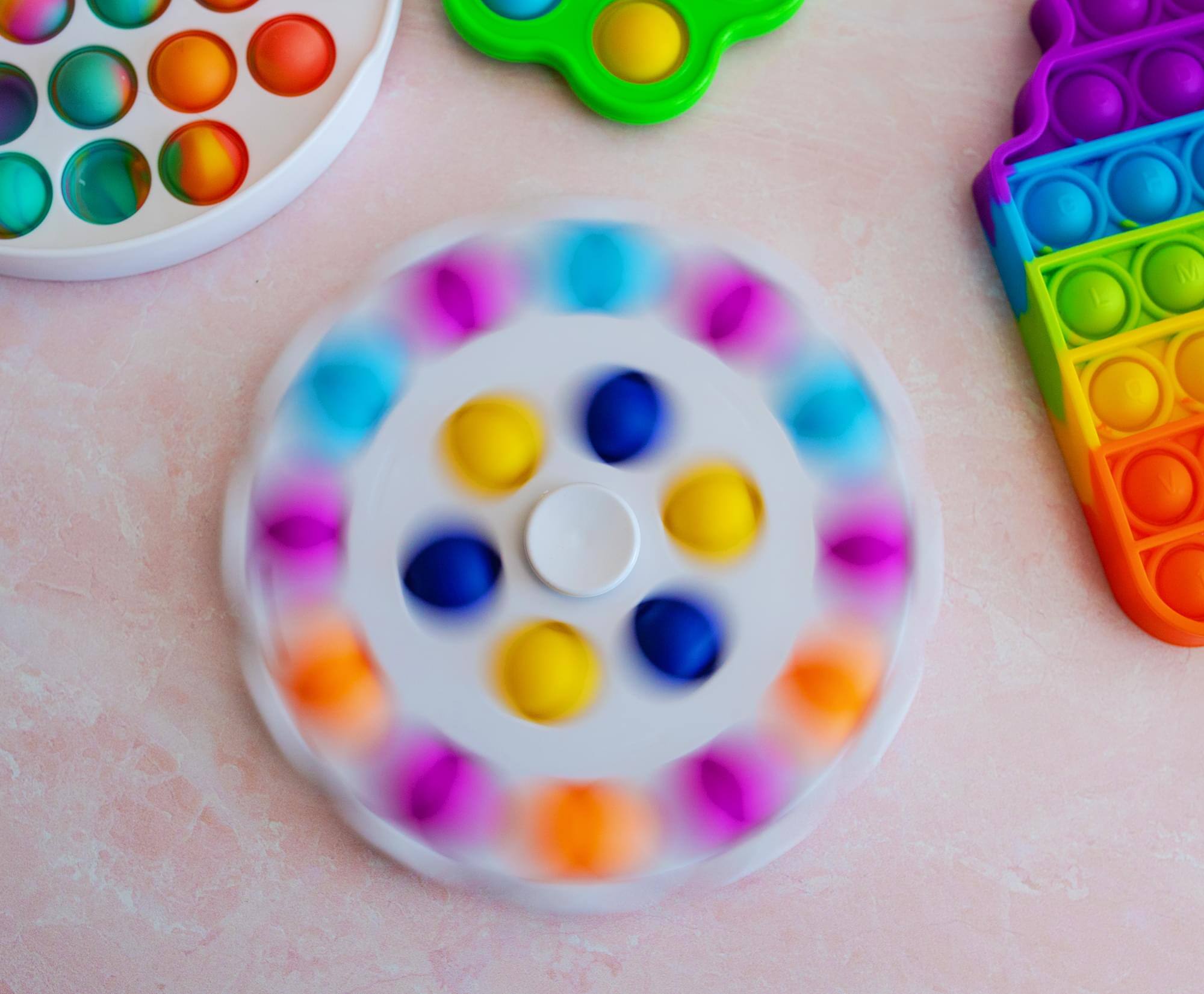 Alt View 4. Toynk - Pop Fidget Toy Spinner White 18-Button Bubble Popping Game - White.